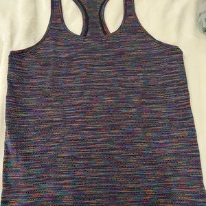 Extremely good used condition LULULEMON size 12 “love” swiftly tank top 🌈
